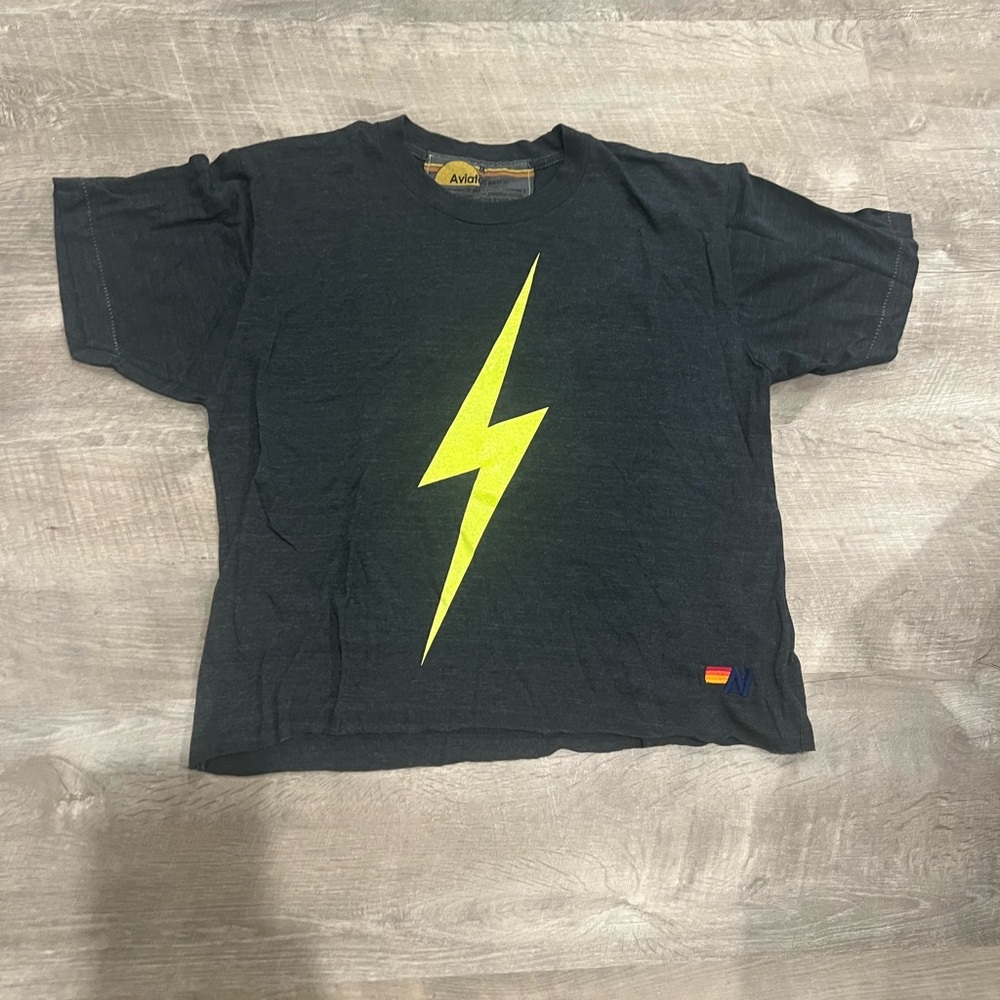 Aviator Nation dark Charcoal tee with florescent lightning bolt, size medium.